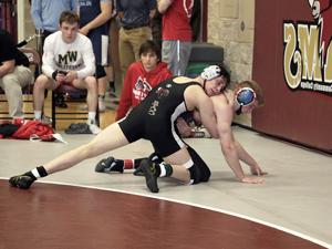 men's wrestler making a pin